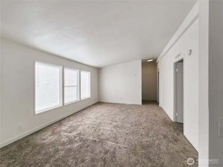 Second living space provides flexibility for a media room, play area or the perfect place for game night with easy flow to the kitchen guest bath and bedrooms.