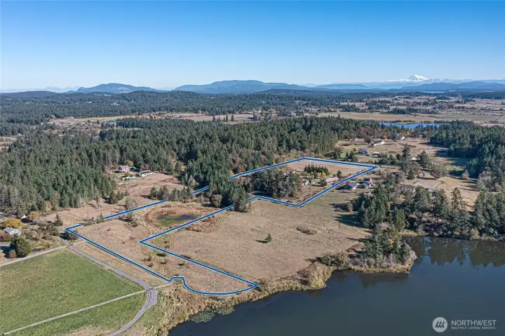 Northeast vantage of the property features a dogleg access to Woods Reservoir. Ideal for recreational access.