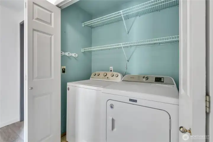 washer dryer set in hallway