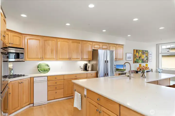 Spacious kitchen with tons of cabinets and counter space.
