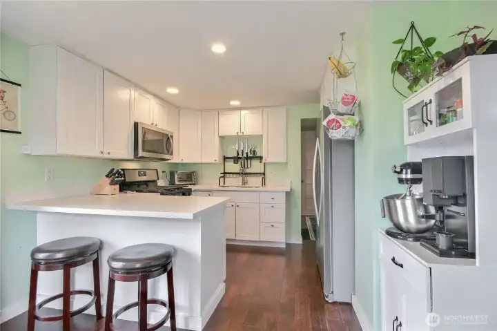 Updated kitchen with bar seating.