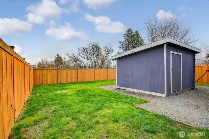Oversized shed/workshop offers additional storage options.