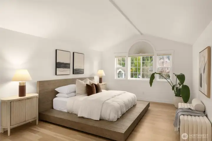 luxurious primary suite offers a serene e scape, complete with dual walk-in closets