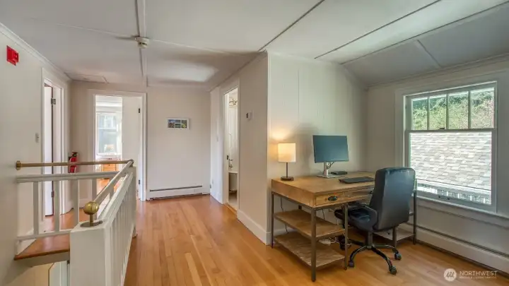 Upstairs landing with an office space.