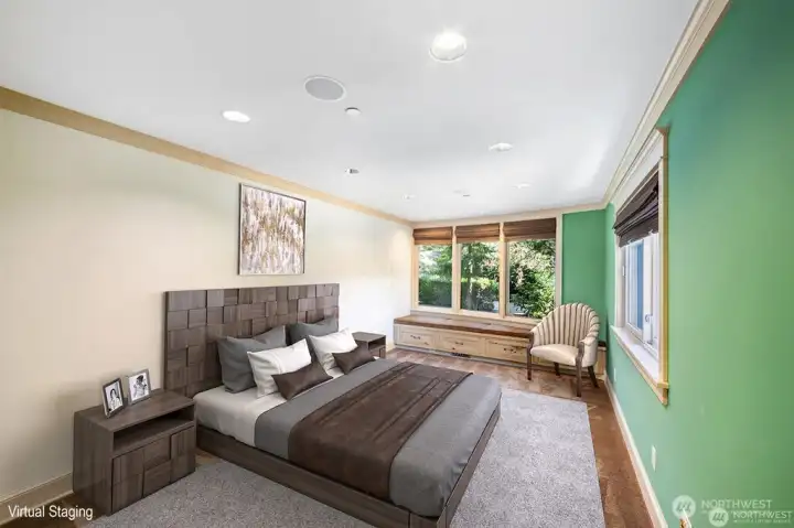 Another bedroom in the Childrens Wing with built-in dresser in closet. Window seat with ample storage below is always appreciated.
