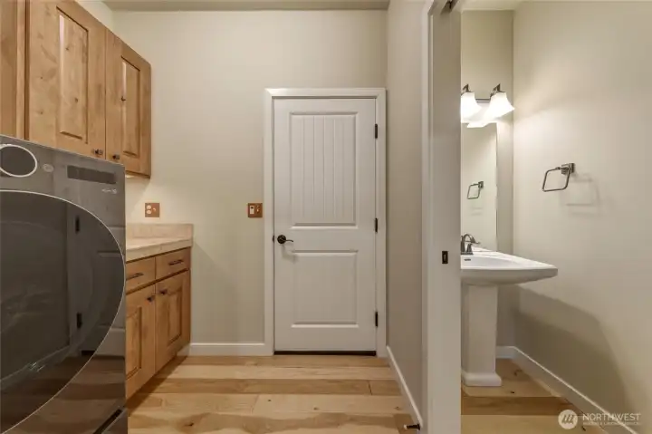 Laundry area and half bath view