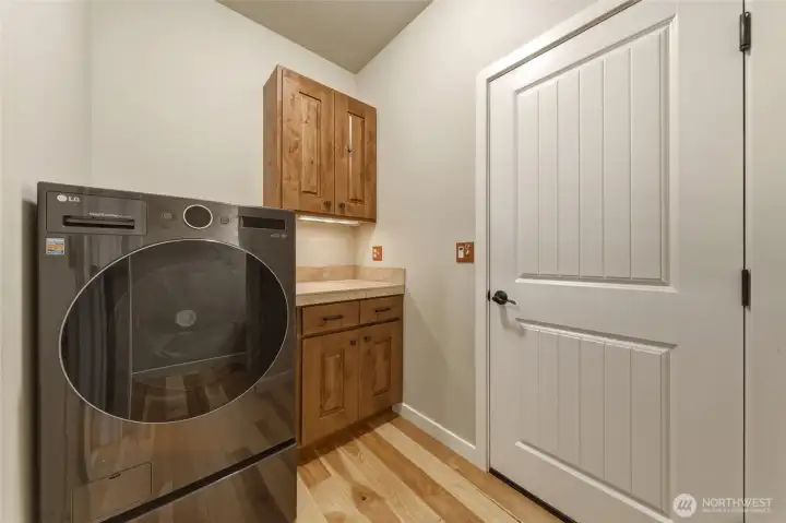 Laundry area with garage access