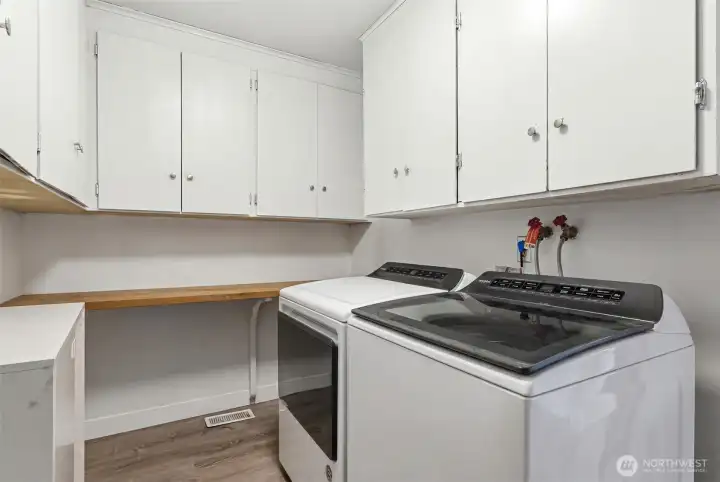 Dedicated laundry area with plenty of storage. Washer & Dryer included!