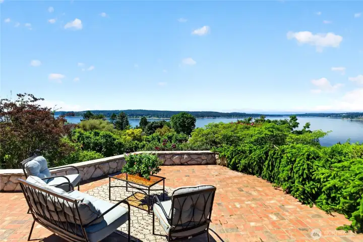 Large stone patio just outside French doors - sit back and enjoy the view.