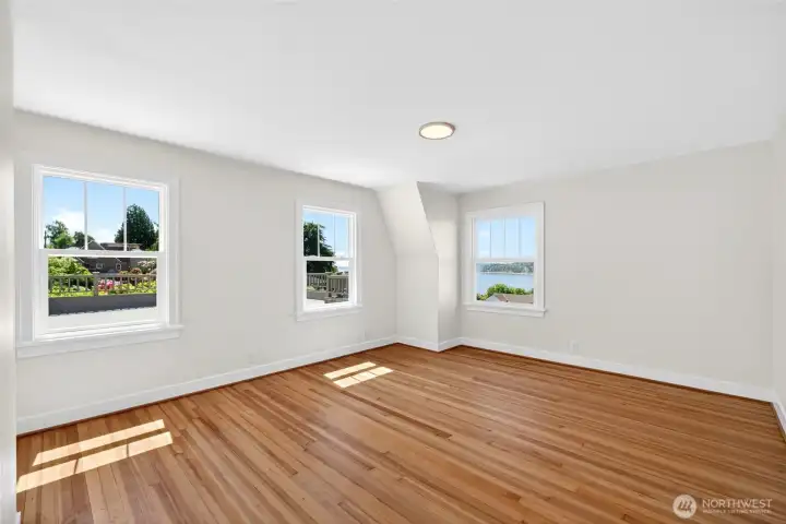 Bedroom #1 upstairs with views of water.