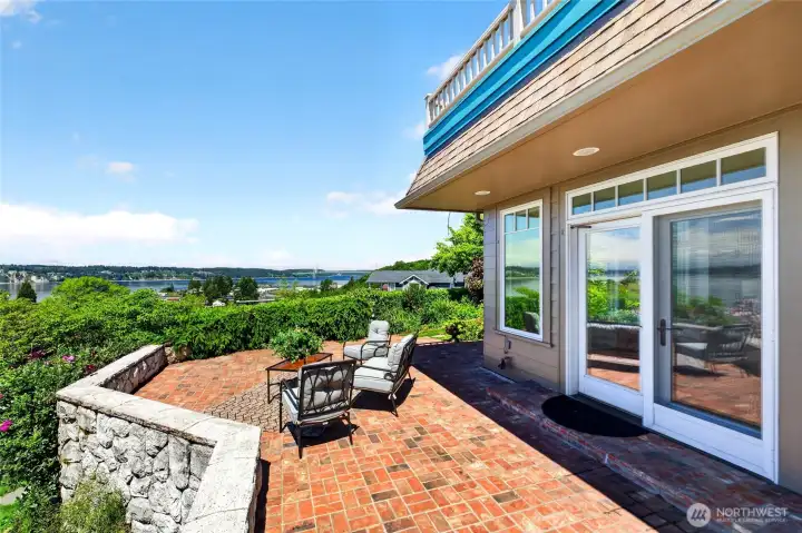 Patio outside front room - bask in the sun and grand view of the water