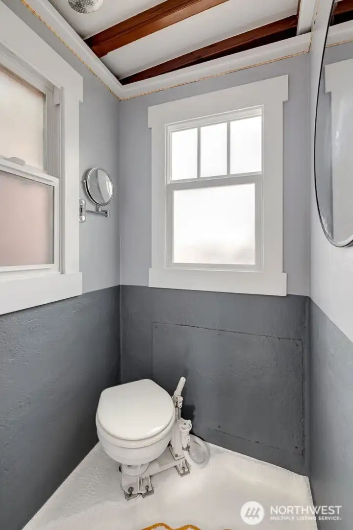 Bathroom with toilet and shower.