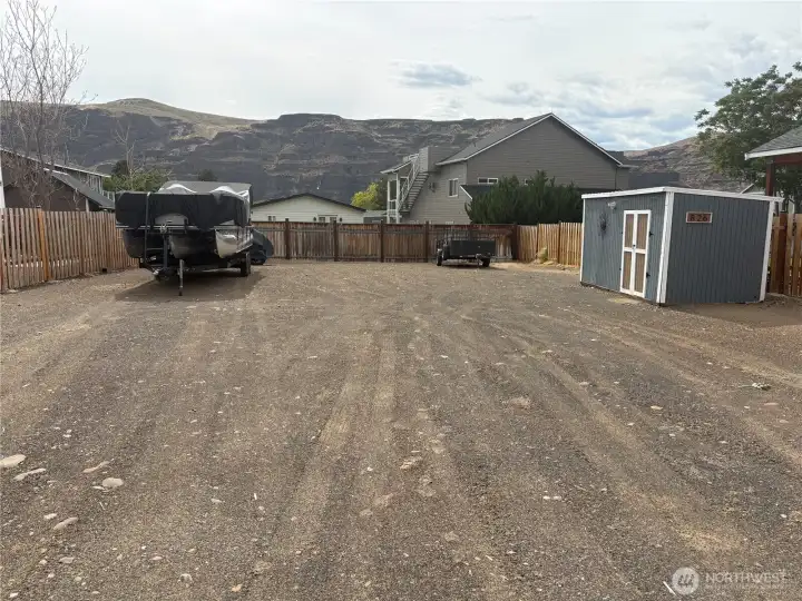 View from the front of the property. See dirt work. Level and ready to build.