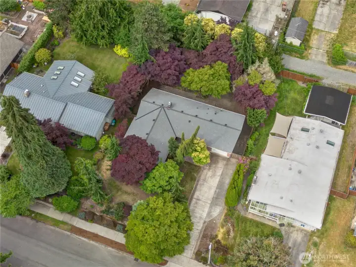 From above, it’s easy to appreciate the generous parking and flexibility offered by the extended driveway. From above, it’s easy to appreciate the generous parking and flexibility offered by the extended driveway.