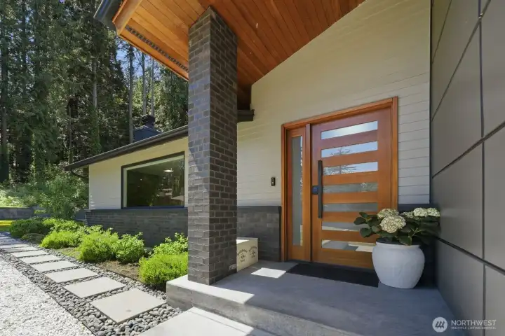 Welcoming front entrance with private setting.