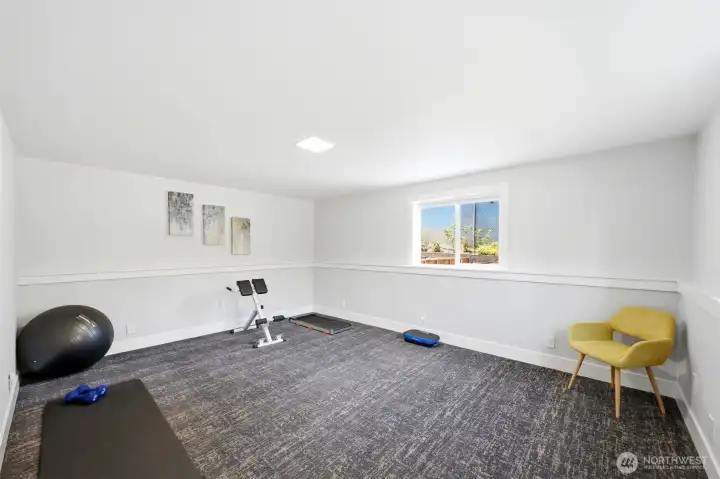 Versatile bonus room for hobbies, recreation, or additional living space.