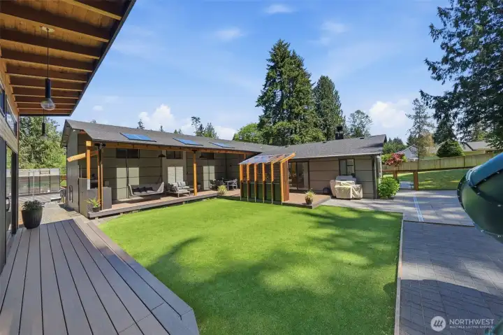 Enjoy summer nights on expansive covered deck designed for year-round enjoyment.