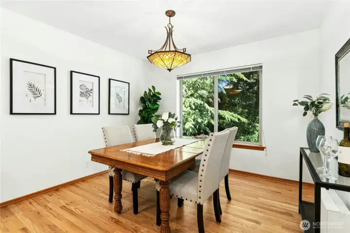 Dining Room overlooks mature landscaping. Dining Room overlooks mature landscaping.