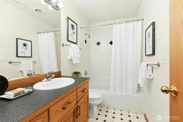 Lower-level full bathroom. Lower-level full bathroom.