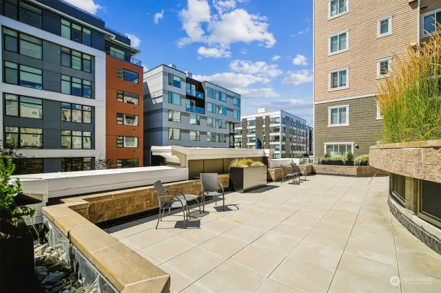 The outdoor courtyard is spacious and easily accessible from this home.