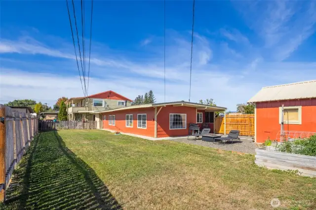 2bed/1bath home with upgraded windows, natural gas freestanding stove, covered patio, and a great rental history!