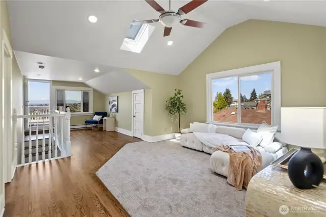 top floor sitting area with balcony and view