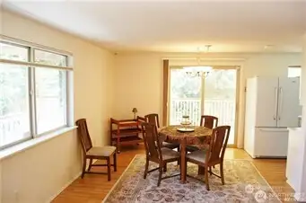 Eat your meals with a view of the back and side yard.