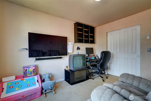 Spacious and bright 3rd bedroom at the front of the home.