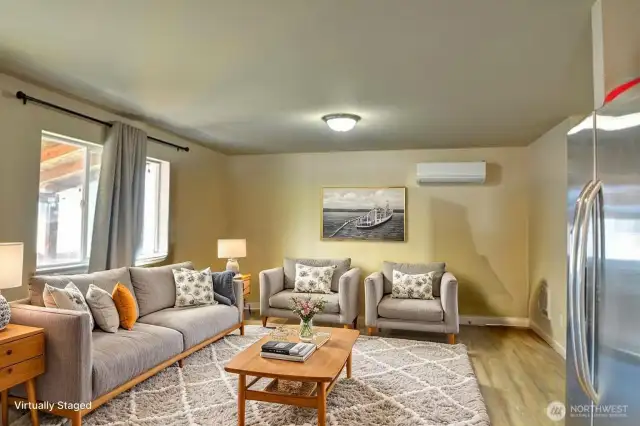 Virtually staged living room to show alternative style and function.