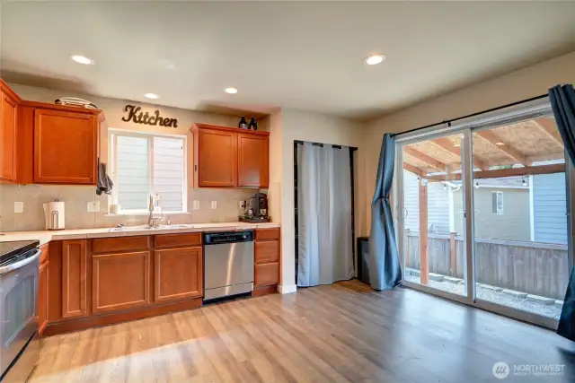 Large slider provides natural light in the kitchen and access the back yard.