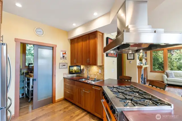 Cherry cabinets, paper stone counters, large walk-in pantry.