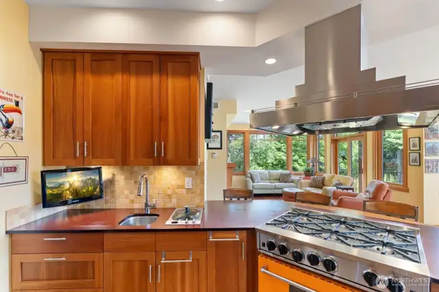 Lovely spaces in a light filled room allowing for inclusion while cooking.