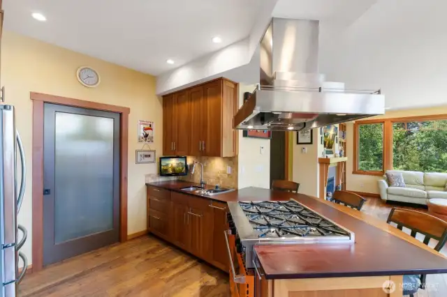 Stove is the center of all that happens in this open floor plan.