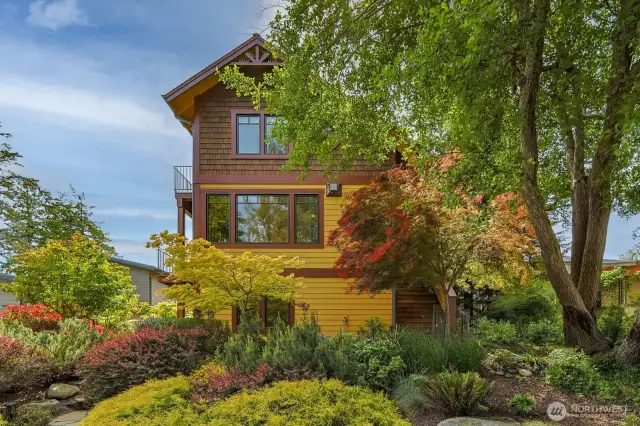 Home newly painted exterior-2024. Mature landscaping, with irrigation system installed for easy maintenance