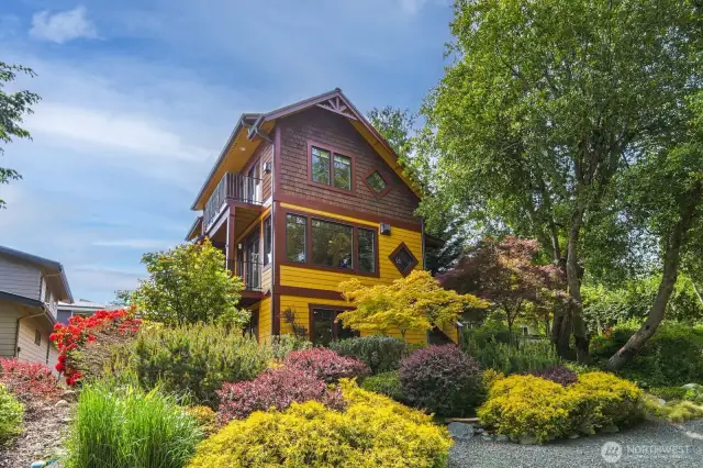 Balconies are on the South side of the home, guest parking in front, garage is in the back