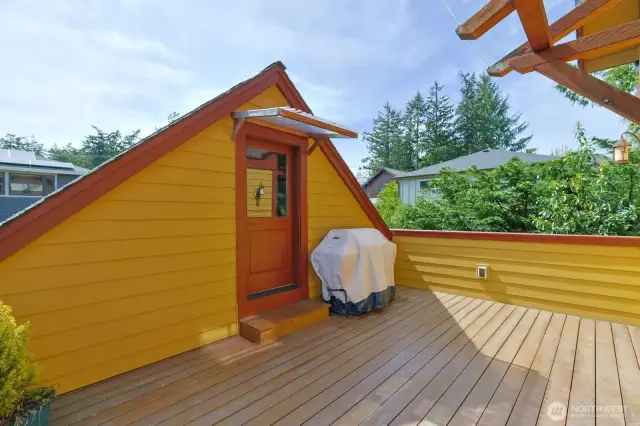Private deck between the 2nd floor and the garage attic space.