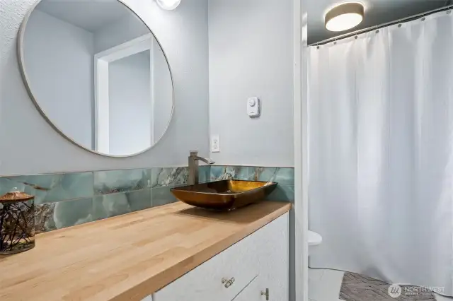 Renovated bathroom on upper level.