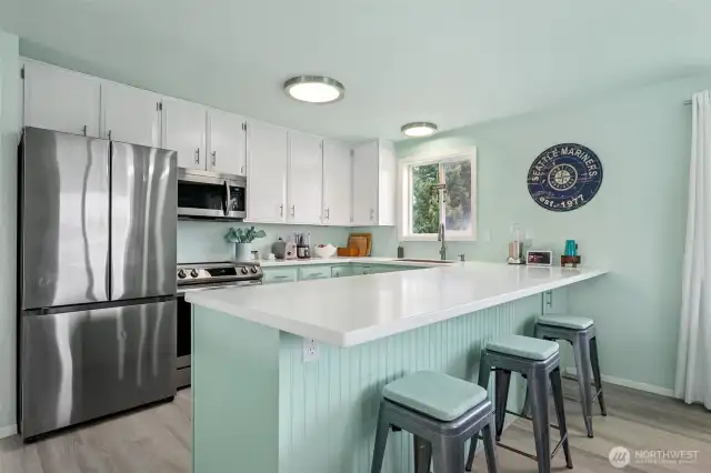 Cooks kitchen with coastal touches.