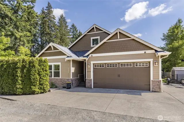 Beautiful home with great features like durable cement planked siding, wired for generator, wired for EV charging, and includes a plumbing leak alert system!