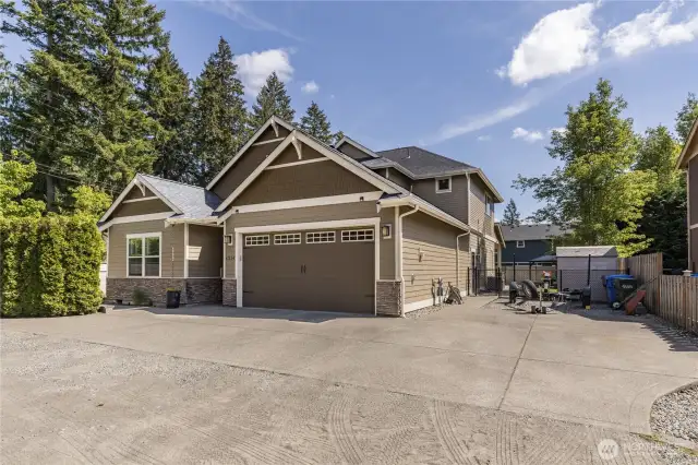 Attached 3-car tandem garage plus extensive driveway for RV/boat parking