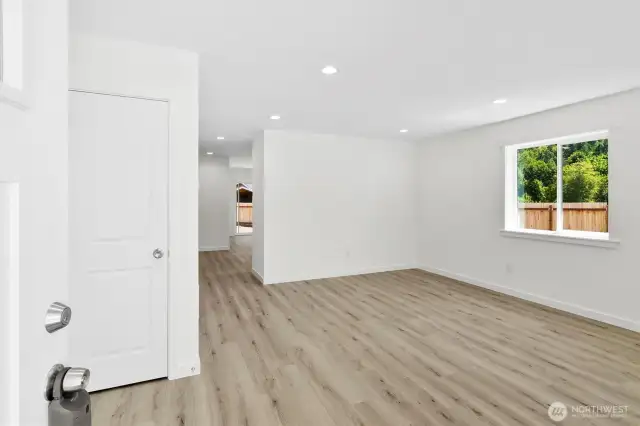 Living room complete with coat closet.