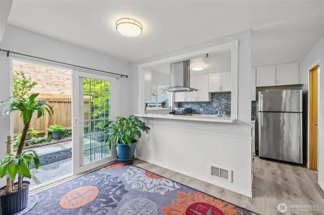 Thoughtful design connects the living and dining spaces, allowing for easy entertaining and everyday comfort.