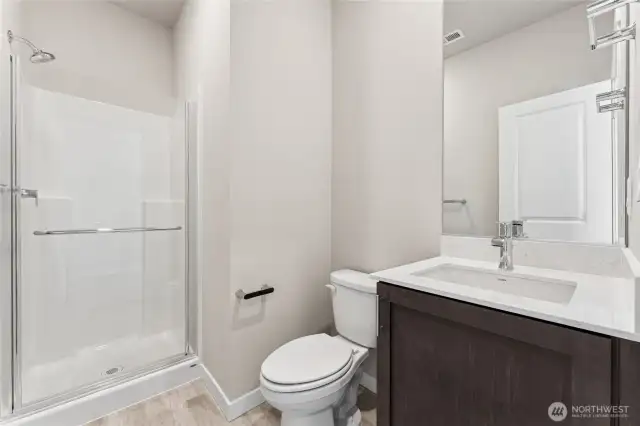 3/4 Bathroom since there is a bedroom on the main floor.   Photos are for representational purposes only. Colors and finishes may vary