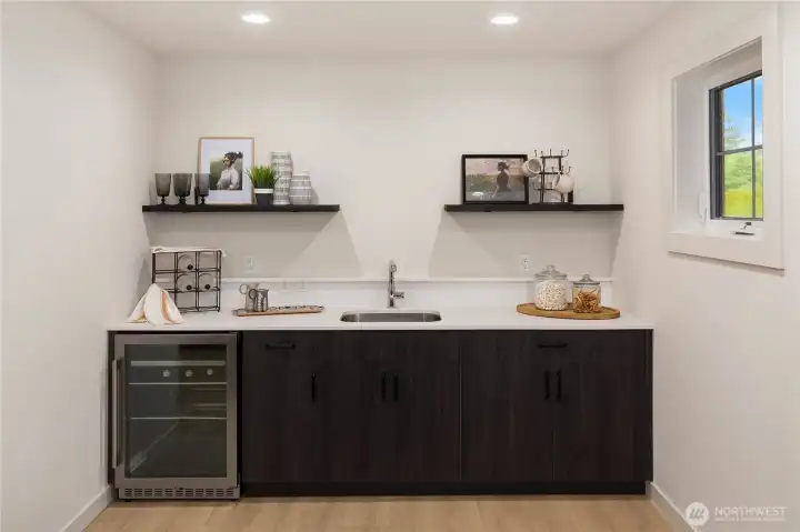 wet bar in spacious bonus space above garage