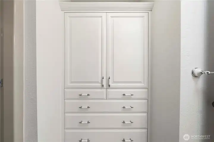Guest bathroom with built-ins for extra storage.