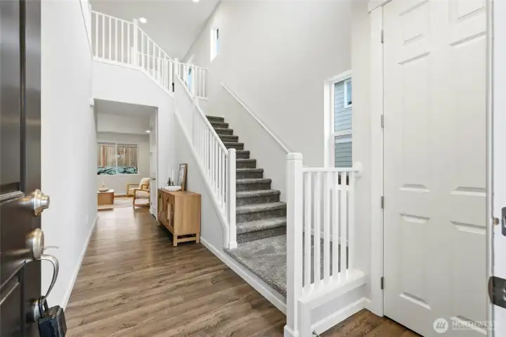 Entry features vaulted ceilings and lots of natural light