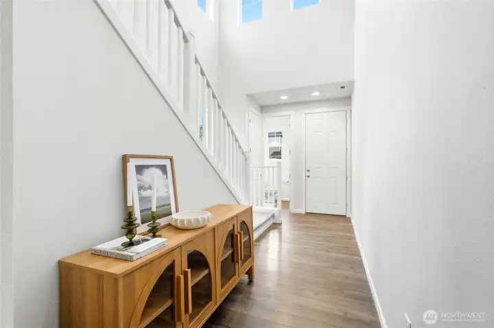 Entry features vaulted ceilings and lots of natural light