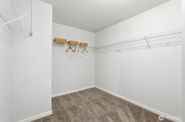 Large walk-in closet in primary suite