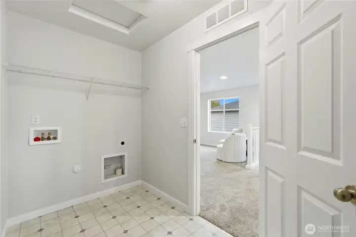 Large laundry room on 2nd level with laundry hook-ups