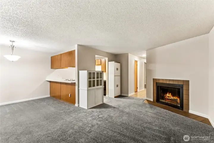 New carpet in living room, new interior paint, newer laminate hardwoods.  Wood burning fireplace.